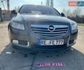 Серый Опель Инсигния, объемом двигателя 1.8 л и пробегом 208 тыс. км за 7400 $, фото 4 на Automoto.ua