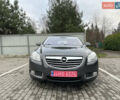 Серый Опель Инсигния, объемом двигателя 1.8 л и пробегом 234 тыс. км за 7500 $, фото 2 на Automoto.ua