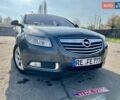 Серый Опель Инсигния, объемом двигателя 1.8 л и пробегом 208 тыс. км за 7400 $, фото 5 на Automoto.ua