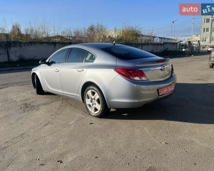 Серый Опель Инсигния, объемом двигателя 1.8 л и пробегом 188 тыс. км за 7200 $, фото 3 на Automoto.ua