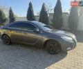 Серый Опель Инсигния, объемом двигателя 2 л и пробегом 263 тыс. км за 7300 $, фото 1 на Automoto.ua
