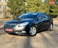 Серый Опель Инсигния, объемом двигателя 1.8 л и пробегом 102 тыс. км за 7400 $, фото 1 на Automoto.ua
