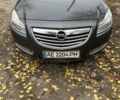 Серый Опель Инсигния, объемом двигателя 2 л и пробегом 246 тыс. км за 7500 $, фото 1 на Automoto.ua