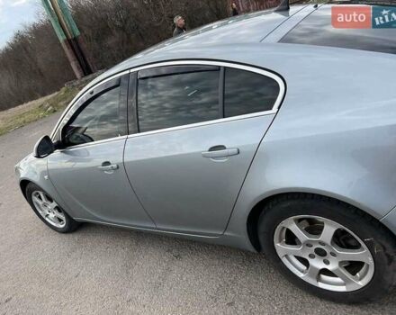 Серый Опель Инсигния, объемом двигателя 2 л и пробегом 378 тыс. км за 7200 $, фото 3 на Automoto.ua