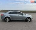 Серый Опель Инсигния, объемом двигателя 2 л и пробегом 378 тыс. км за 7200 $, фото 1 на Automoto.ua