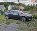 Серый Опель Инсигния, объемом двигателя 2 л и пробегом 307 тыс. км за 5000 $, фото 1 на Automoto.ua