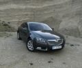 Серый Опель Инсигния, объемом двигателя 2 л и пробегом 378 тыс. км за 7350 $, фото 1 на Automoto.ua
