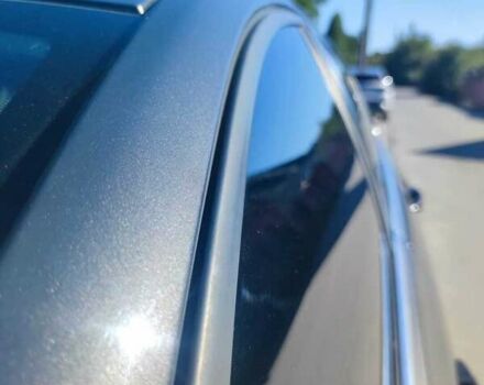 Серый Опель Инсигния, объемом двигателя 2 л и пробегом 256 тыс. км за 13000 $, фото 7 на Automoto.ua