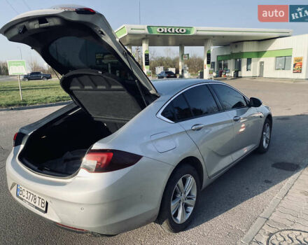 Серый Опель Инсигния, объемом двигателя 1.6 л и пробегом 200 тыс. км за 14400 $, фото 4 на Automoto.ua