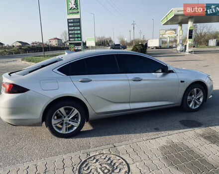 Серый Опель Инсигния, объемом двигателя 1.6 л и пробегом 200 тыс. км за 14400 $, фото 3 на Automoto.ua