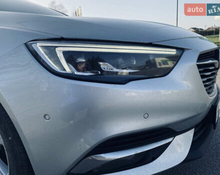 Серый Опель Инсигния, объемом двигателя 1.6 л и пробегом 200 тыс. км за 14400 $, фото 5 на Automoto.ua