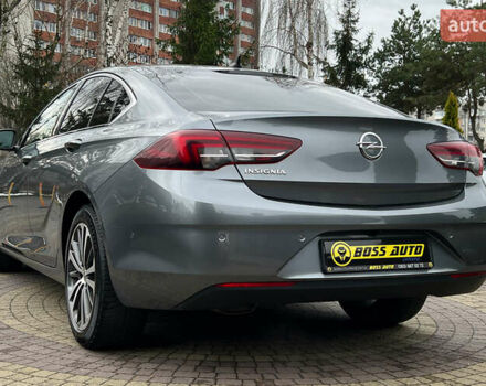 Сірий Опель Інсігнія, об'ємом двигуна 1.96 л та пробігом 113 тис. км за 18700 $, фото 4 на Automoto.ua