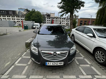 Серый Опель Инсигния, объемом двигателя 2 л и пробегом 326 тыс. км за 7000 $, фото 1 на Automoto.ua