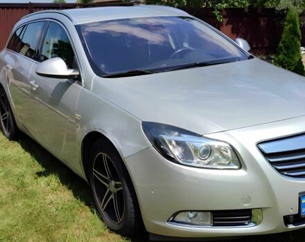 Серый Опель Инсигния, объемом двигателя 2 л и пробегом 243 тыс. км за 6999 $, фото 1 на Automoto.ua