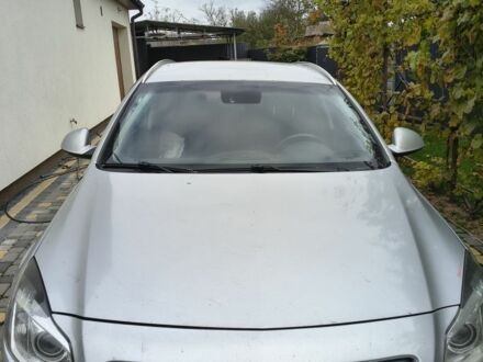 Серый Опель Инсигния, объемом двигателя 1.6 л и пробегом 185 тыс. км за 4500 $, фото 1 на Automoto.ua