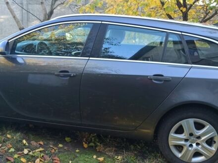 Серый Опель Инсигния, объемом двигателя 2 л и пробегом 300 тыс. км за 6500 $, фото 1 на Automoto.ua