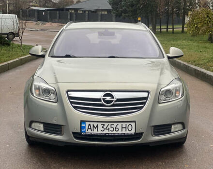 Серый Опель Инсигния, объемом двигателя 2 л и пробегом 299 тыс. км за 7500 $, фото 1 на Automoto.ua