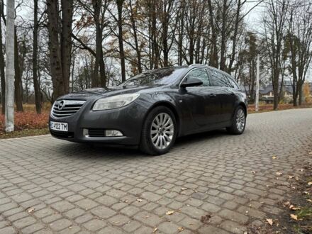 Серый Опель Инсигния, объемом двигателя 2 л и пробегом 210 тыс. км за 159 $, фото 1 на Automoto.ua