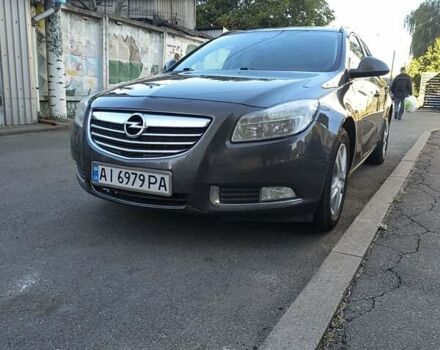 Серый Опель Инсигния, объемом двигателя 1.96 л и пробегом 240 тыс. км за 6500 $, фото 1 на Automoto.ua