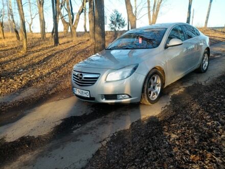 Серый Опель Инсигния, объемом двигателя 2 л и пробегом 235 тыс. км за 6800 $, фото 1 на Automoto.ua