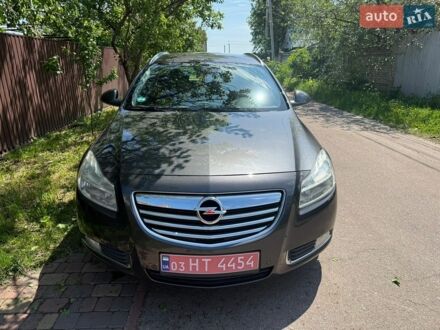 Серый Опель Инсигния, объемом двигателя 1.8 л и пробегом 237 тыс. км за 7500 $, фото 1 на Automoto.ua