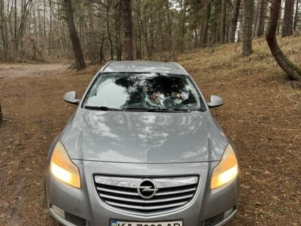 Серый Опель Инсигния, объемом двигателя 2 л и пробегом 352 тыс. км за 5600 $, фото 1 на Automoto.ua