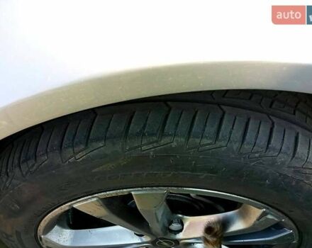 Серый Опель Инсигния, объемом двигателя 2 л и пробегом 999 тыс. км за 7500 $, фото 1 на Automoto.ua