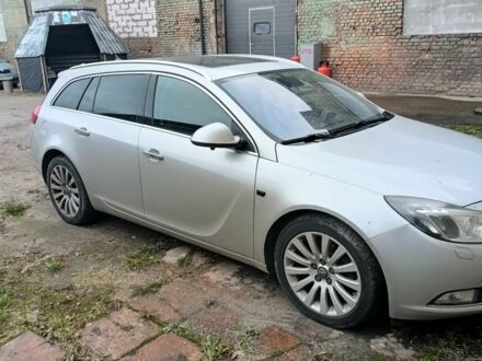 Серый Опель Инсигния, объемом двигателя 2 л и пробегом 238 тыс. км за 8400 $, фото 1 на Automoto.ua