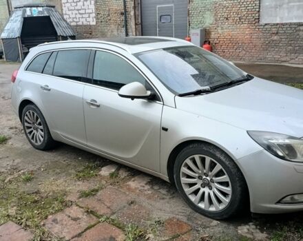 Серый Опель Инсигния, объемом двигателя 2 л и пробегом 238 тыс. км за 8400 $, фото 1 на Automoto.ua