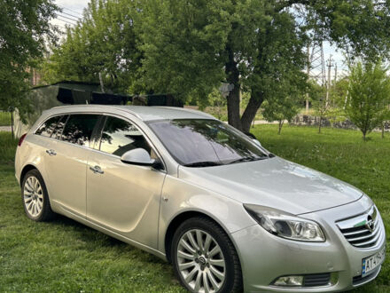 Серый Опель Инсигния, объемом двигателя 2 л и пробегом 256 тыс. км за 8500 $, фото 1 на Automoto.ua