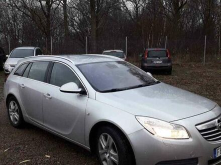 Серый Опель Инсигния, объемом двигателя 1.8 л и пробегом 160 тыс. км за 7999 $, фото 1 на Automoto.ua