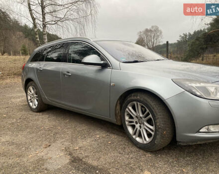 Сірий Опель Інсігнія, об'ємом двигуна 1.96 л та пробігом 203 тис. км за 6999 $, фото 1 на Automoto.ua