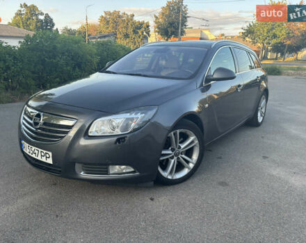 Серый Опель Инсигния, объемом двигателя 1.96 л и пробегом 320 тыс. км за 6999 $, фото 1 на Automoto.ua