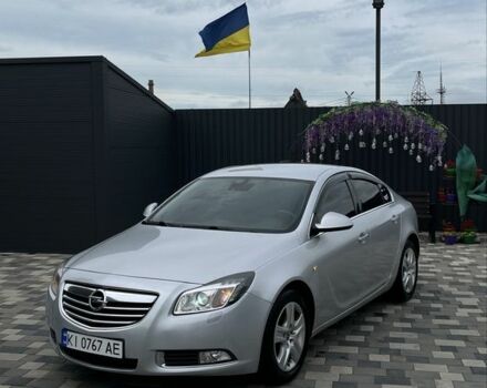 Серый Опель Инсигния, объемом двигателя 2 л и пробегом 310 тыс. км за 7200 $, фото 1 на Automoto.ua