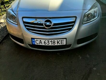Серый Опель Инсигния, объемом двигателя 2 л и пробегом 245 тыс. км за 7100 $, фото 1 на Automoto.ua