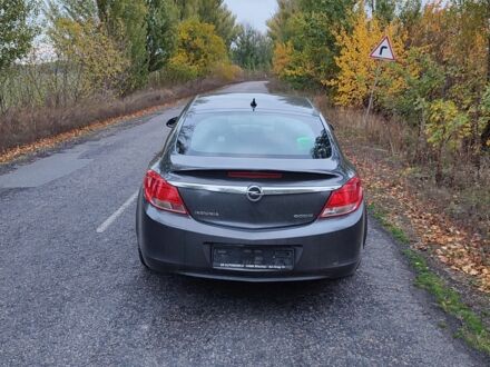 Серый Опель Инсигния, объемом двигателя 2 л и пробегом 280 тыс. км за 7800 $, фото 1 на Automoto.ua