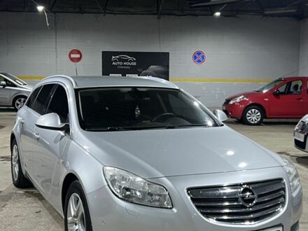 Серый Опель Инсигния, объемом двигателя 1.8 л и пробегом 159 тыс. км за 7999 $, фото 1 на Automoto.ua