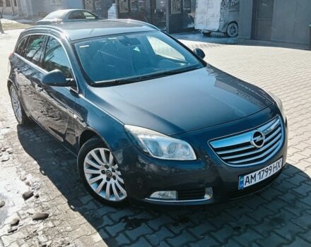 Серый Опель Инсигния, объемом двигателя 2 л и пробегом 318 тыс. км за 5200 $, фото 1 на Automoto.ua