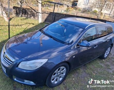 Серый Опель Инсигния, объемом двигателя 2 л и пробегом 320 тыс. км за 6500 $, фото 1 на Automoto.ua