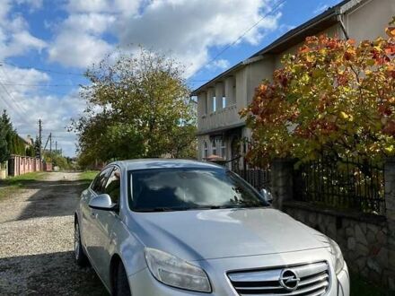 Серый Опель Инсигния, объемом двигателя 2 л и пробегом 245 тыс. км за 7000 $, фото 1 на Automoto.ua