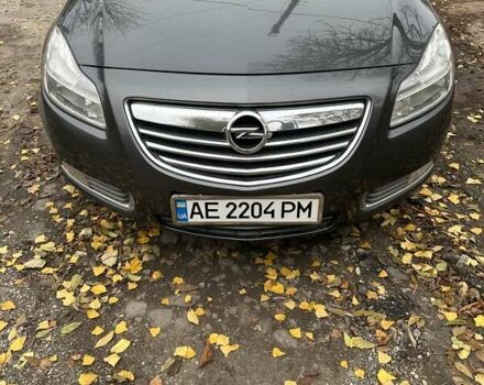 Серый Опель Инсигния, объемом двигателя 2 л и пробегом 246 тыс. км за 7500 $, фото 1 на Automoto.ua
