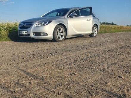 Серый Опель Инсигния, объемом двигателя 2 л и пробегом 196 тыс. км за 9500 $, фото 1 на Automoto.ua