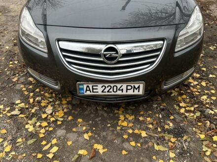Серый Опель Инсигния, объемом двигателя 2 л и пробегом 246 тыс. км за 7500 $, фото 1 на Automoto.ua