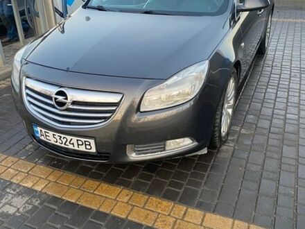 Серый Опель Инсигния, объемом двигателя 2 л и пробегом 310 тыс. км за 8500 $, фото 1 на Automoto.ua
