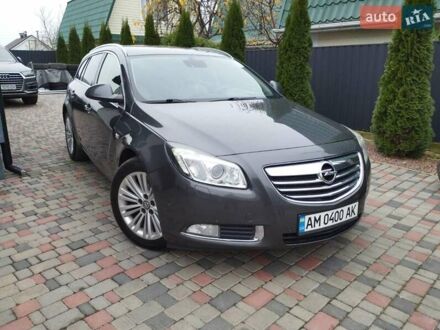 Серый Опель Инсигния, объемом двигателя 2 л и пробегом 293 тыс. км за 9500 $, фото 1 на Automoto.ua