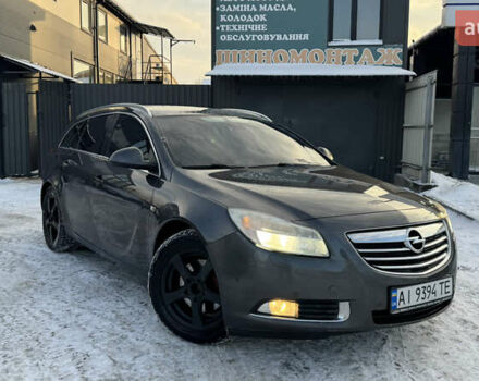 Серый Опель Инсигния, объемом двигателя 2 л и пробегом 293 тыс. км за 8500 $, фото 1 на Automoto.ua
