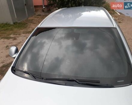 Серый Опель Инсигния, объемом двигателя 2 л и пробегом 220 тыс. км за 10100 $, фото 1 на Automoto.ua