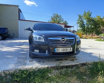 Серый Опель Инсигния, объемом двигателя 2 л и пробегом 221 тыс. км за 9400 $, фото 1 на Automoto.ua