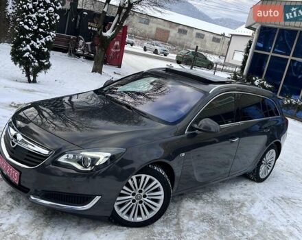 Серый Опель Инсигния, объемом двигателя 2 л и пробегом 220 тыс. км за 12950 $, фото 1 на Automoto.ua