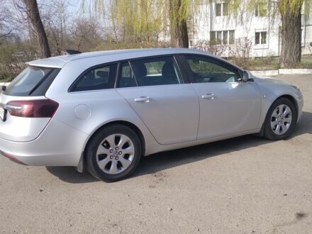 Сірий Опель Інсігнія, об'ємом двигуна 1.96 л та пробігом 255 тис. км за 10000 $, фото 1 на Automoto.ua